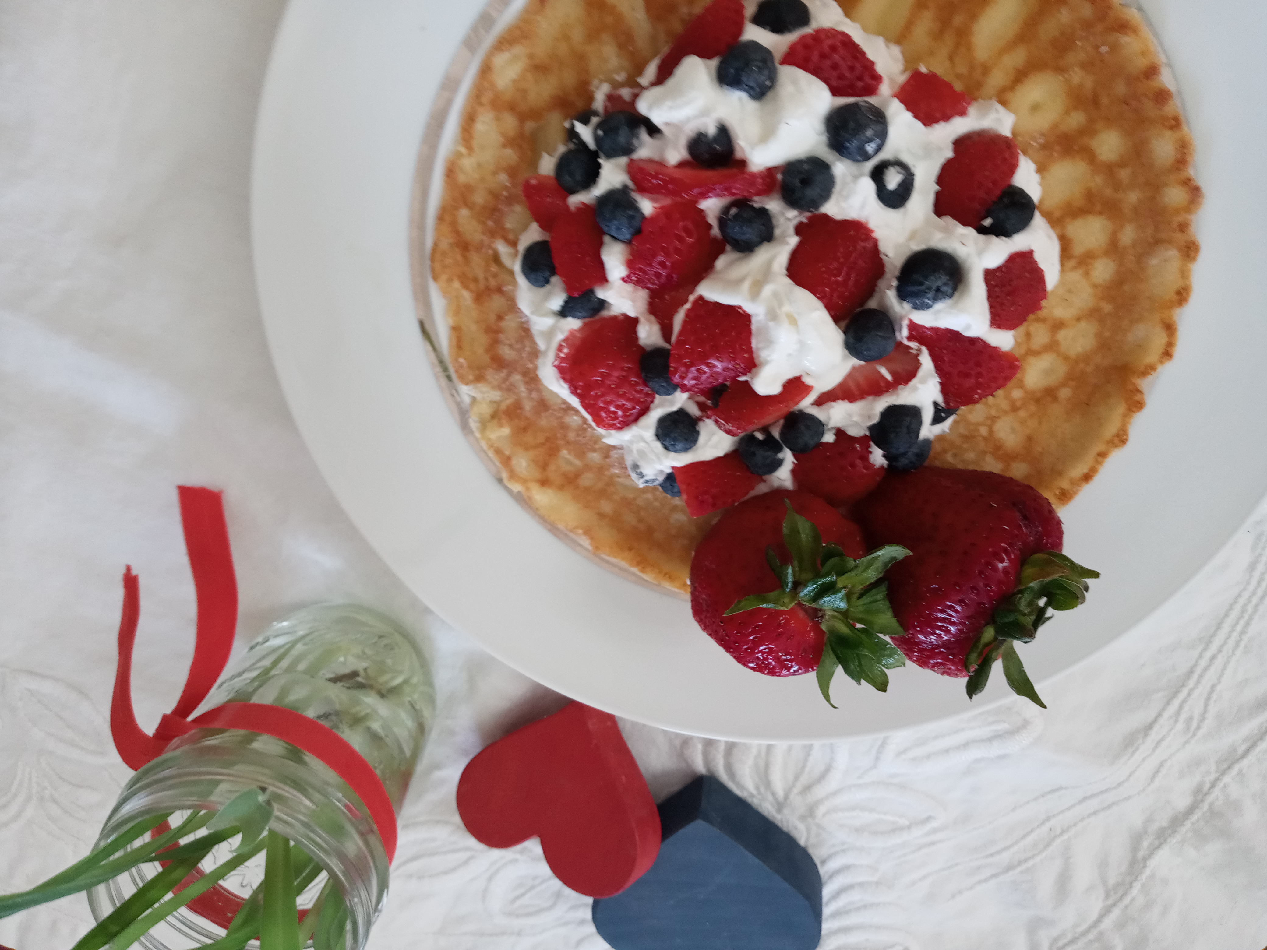 pancake strawberries blueberries whipped cream